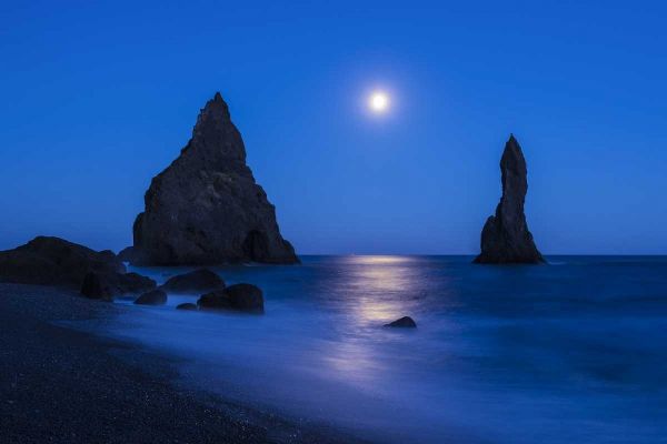 Iceland, Reynisdrangur Moon reflection on ocean